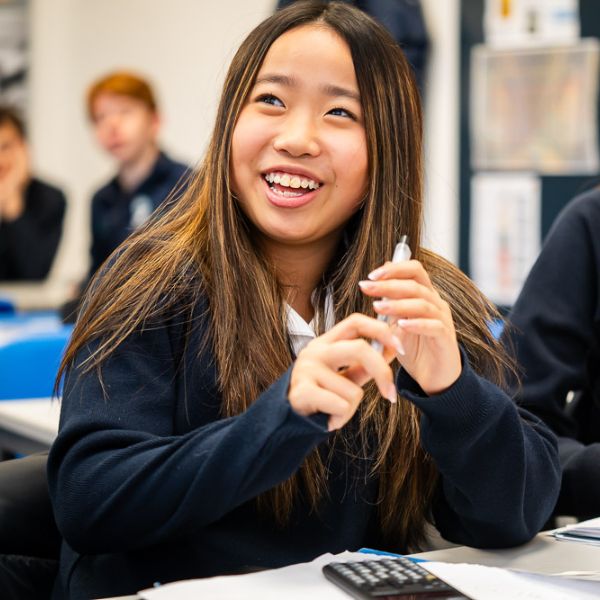 King's Ely student laughing in classroom